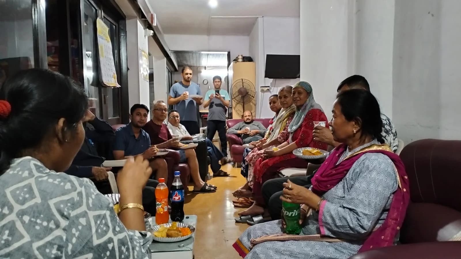 Evening gathering of members and patients at the Mumbai ashram