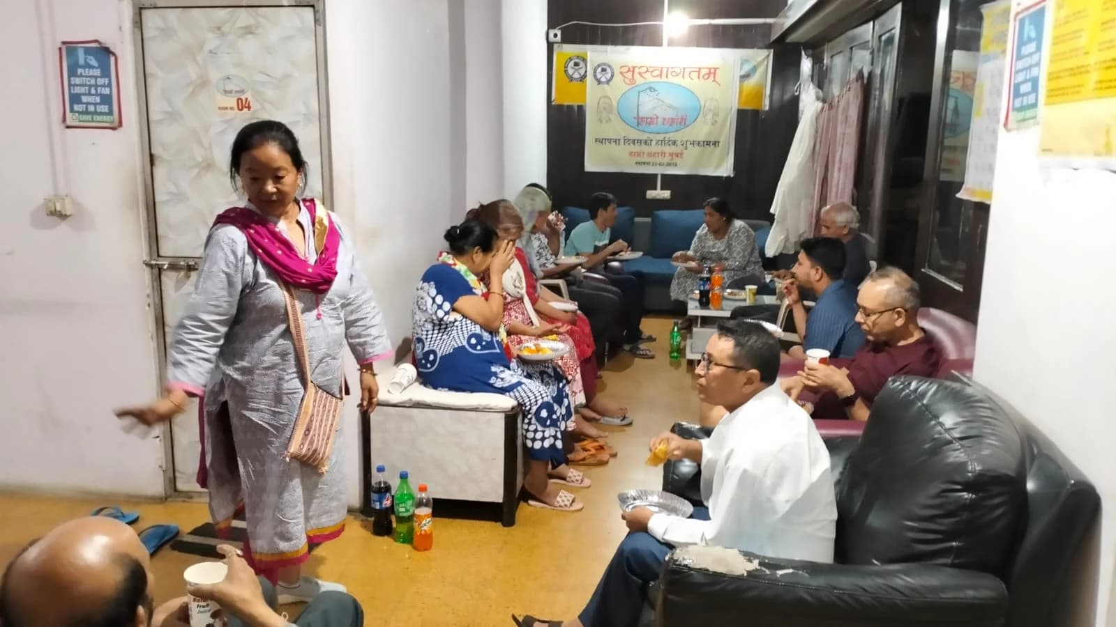 Members and guests sharing refreshments at the Mumbai ashram