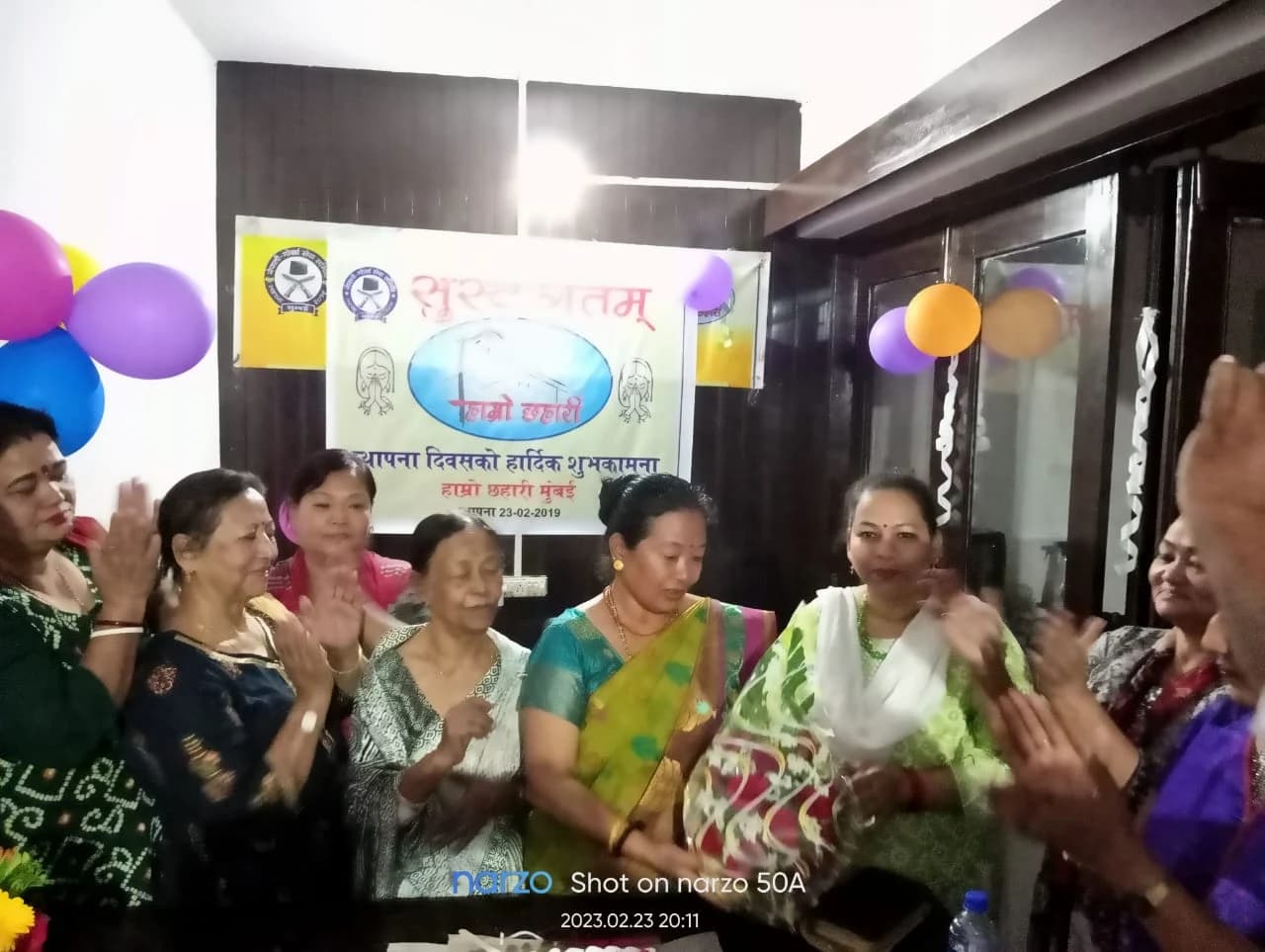 Sthapana Diwas · members applauding during the celebration
