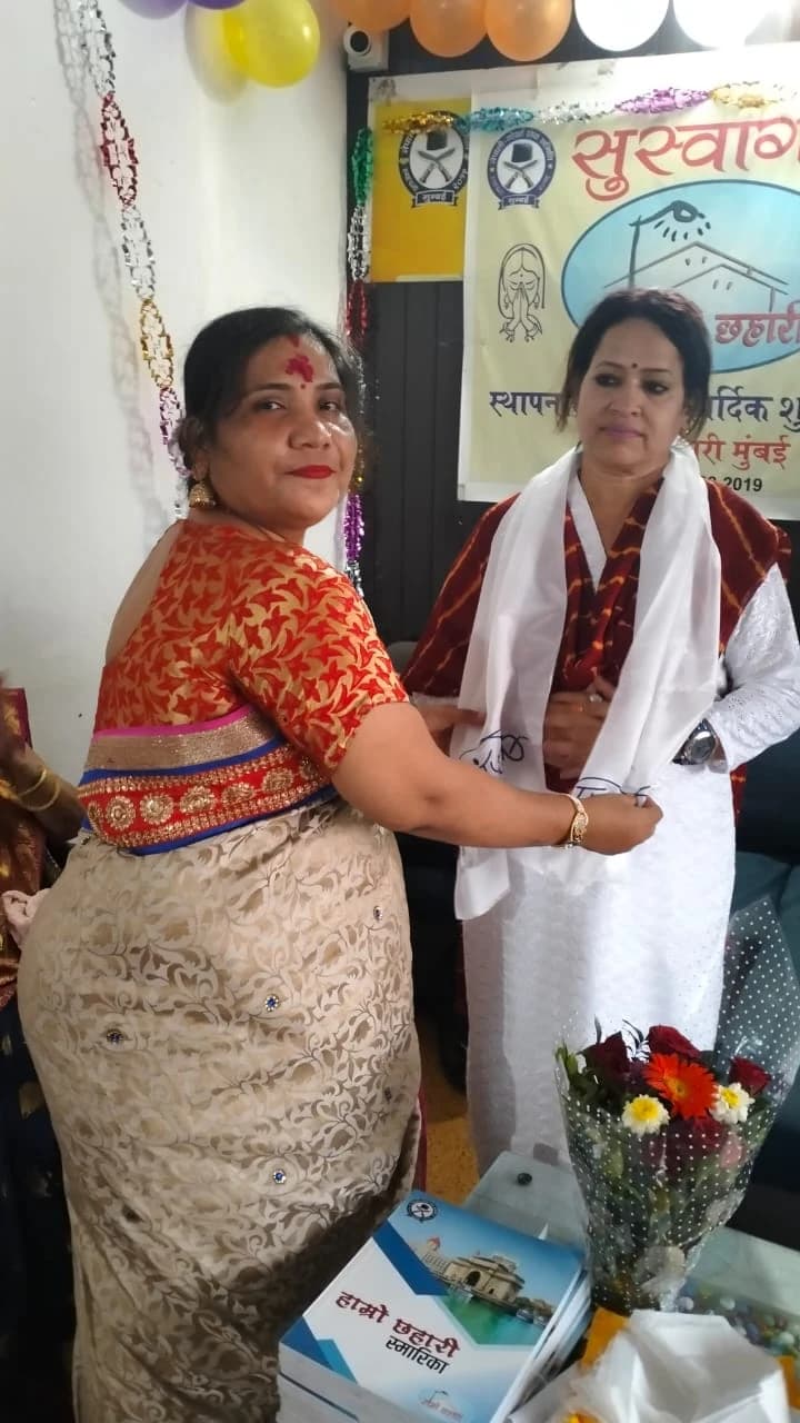 Sthapana Diwas · guest felicitation with khada and bouquet