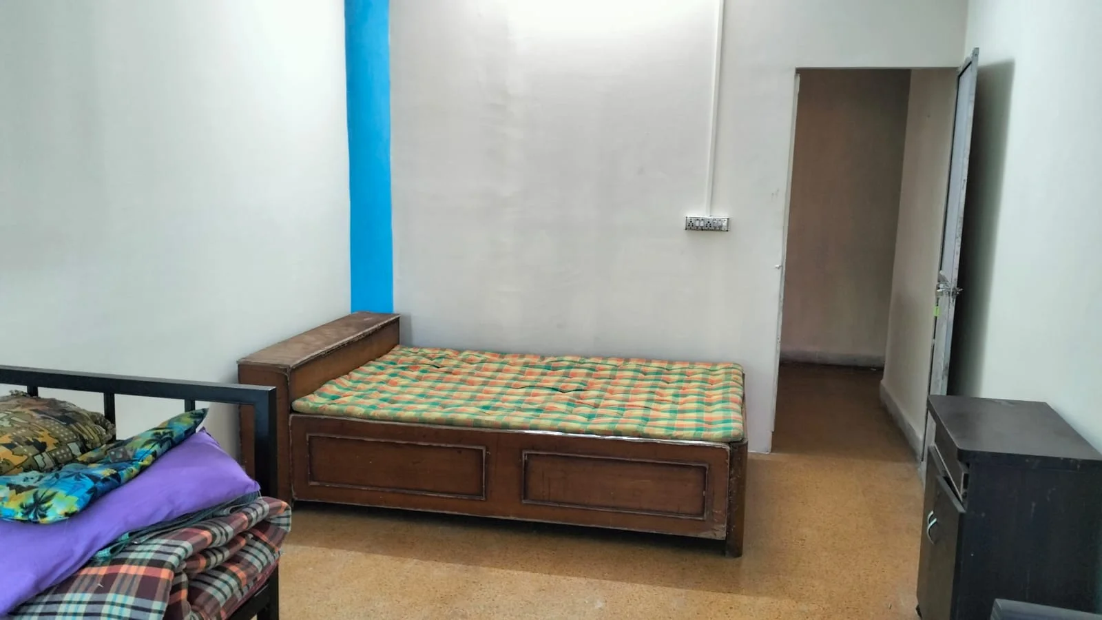 Mumbai ashram · single-bed patient room