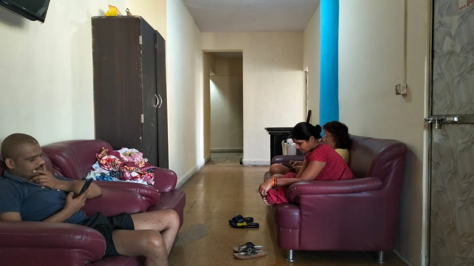 Patient attendants resting at the Mumbai ashram