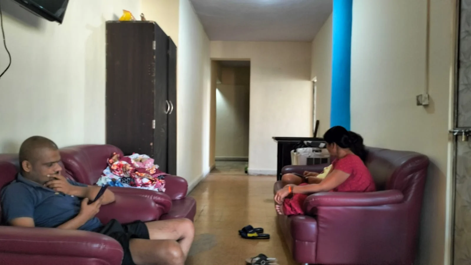 Attendants in the Mumbai ashram common area