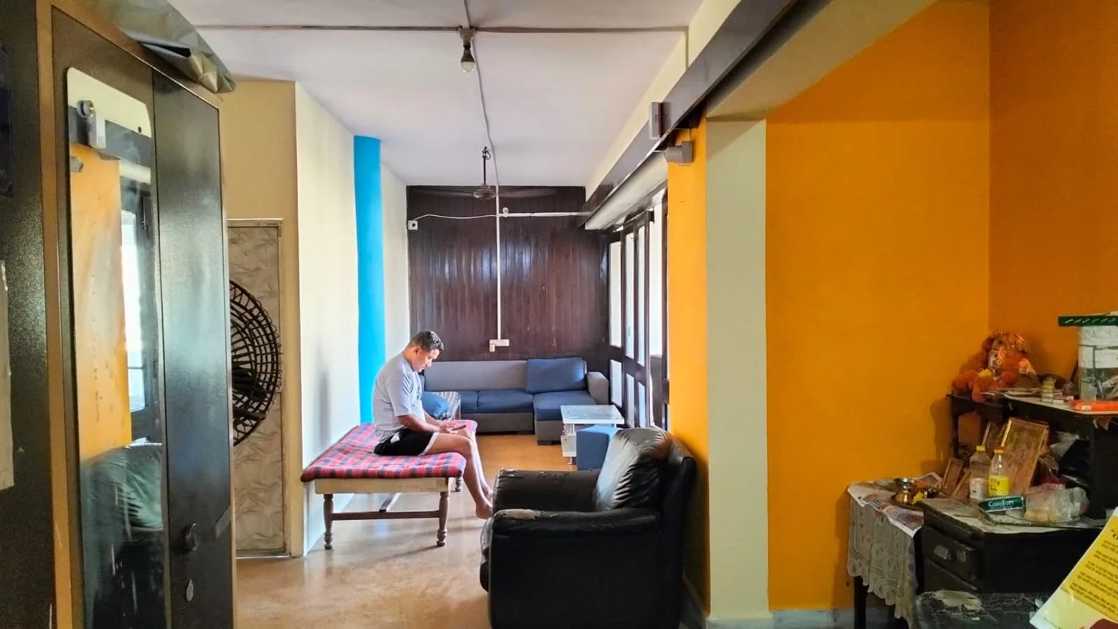 Mumbai ashram common room — daytime view