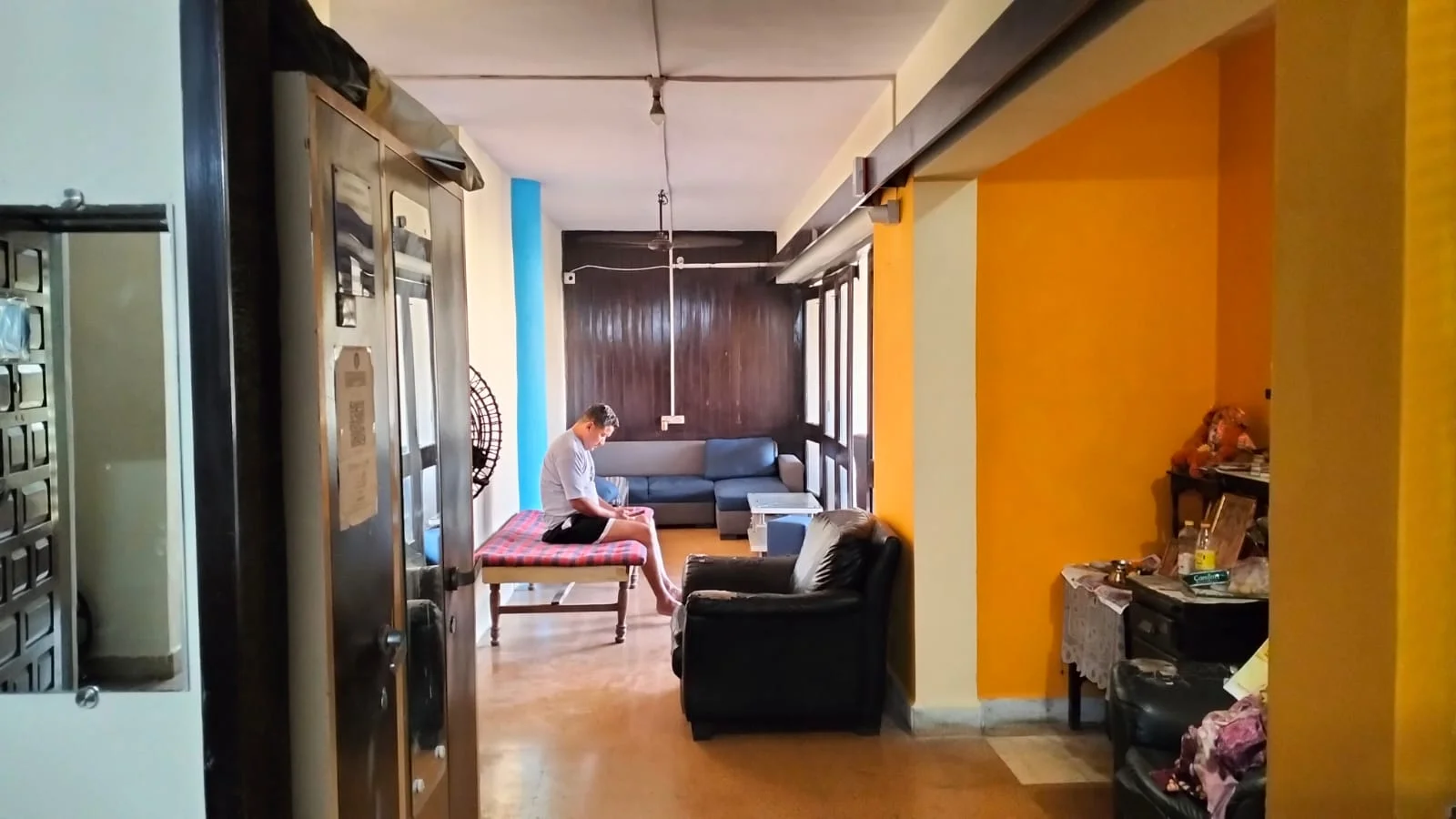 Patient on a bench with caregivers' seating nearby