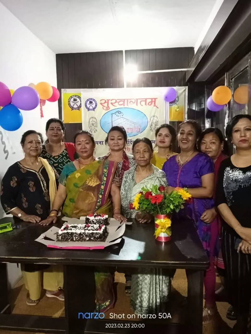 Women members celebrate with cake at the Mumbai ashram