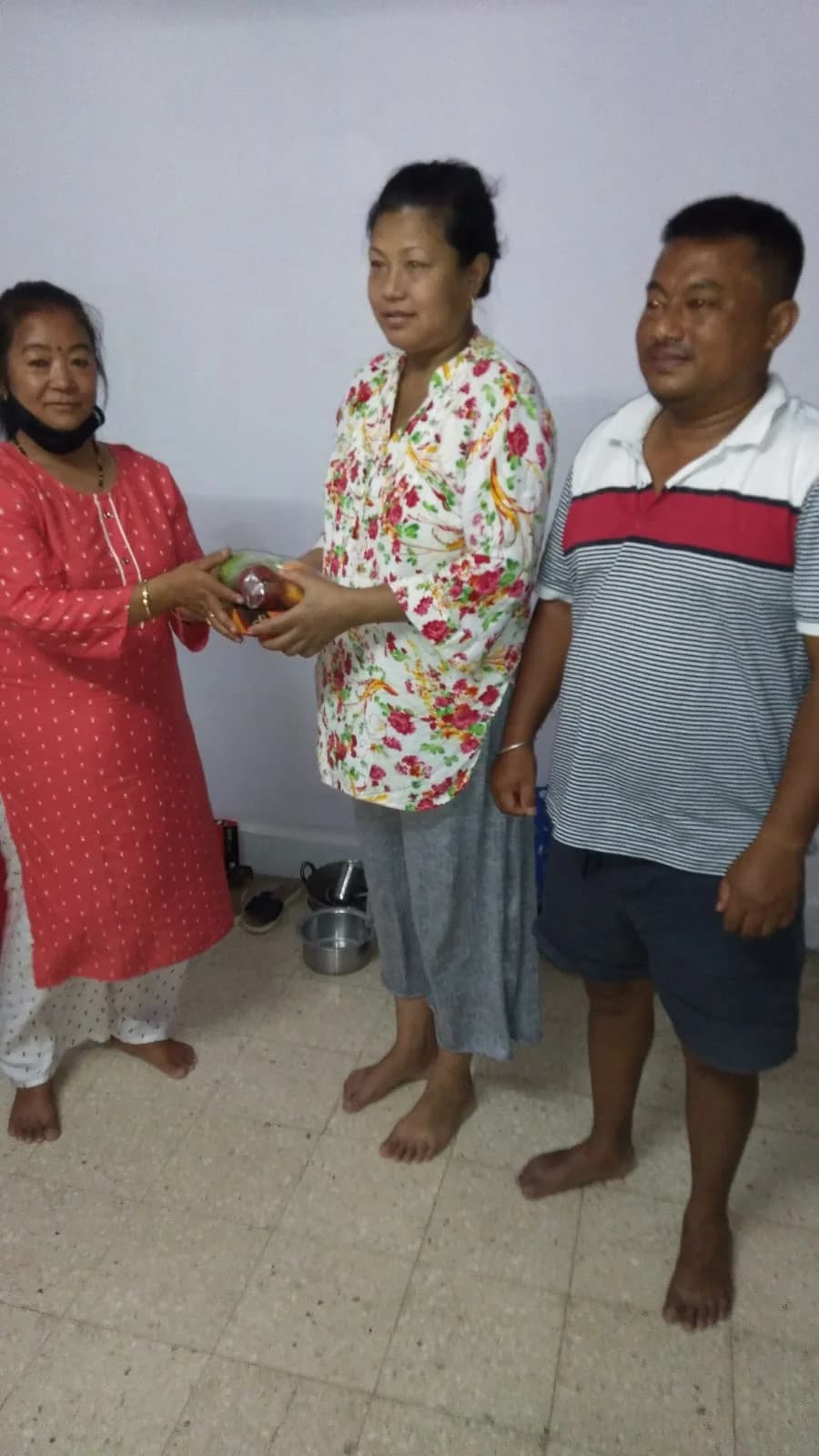 Patient receiving fruits and snacks