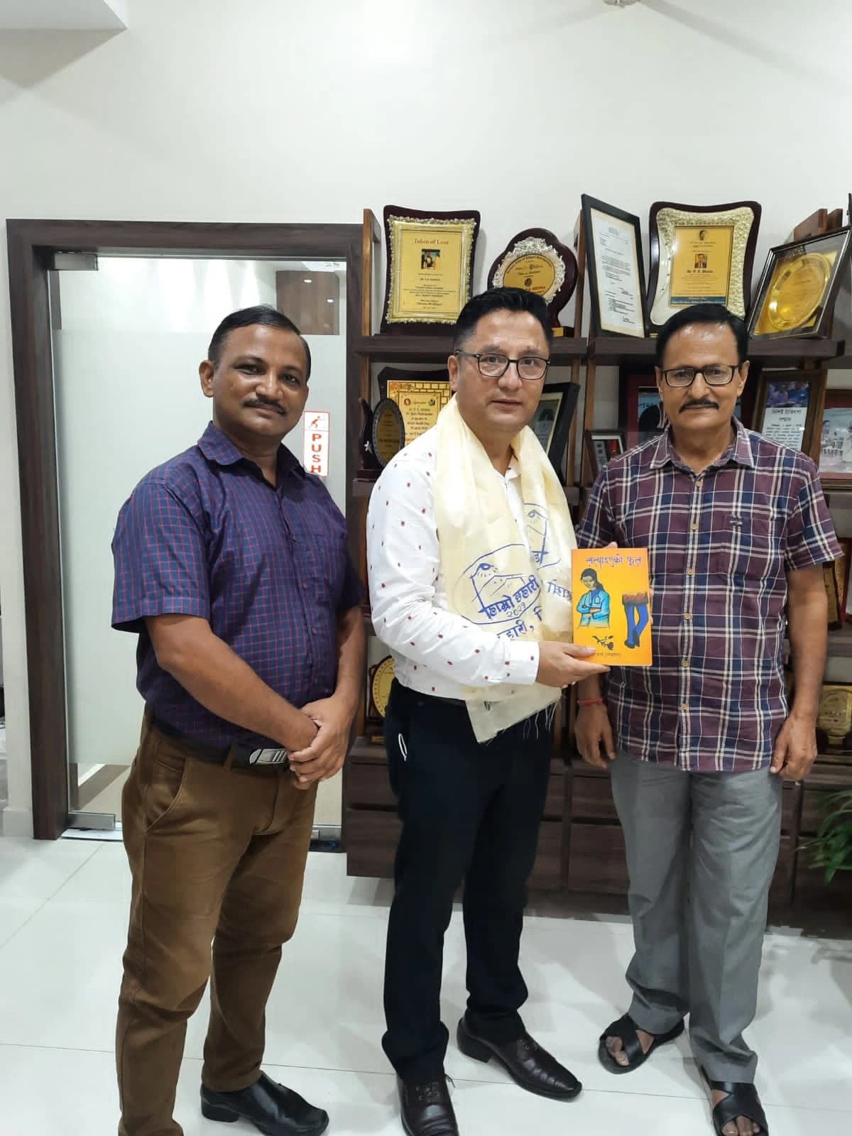 Siliguri — book donation with committee members