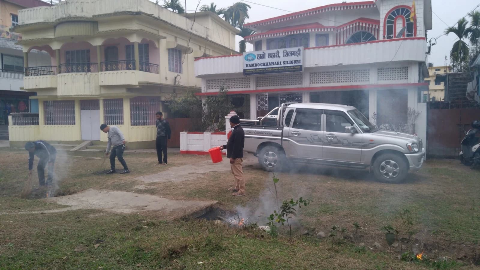 Siliguri — volunteers cleaning the ashram grounds